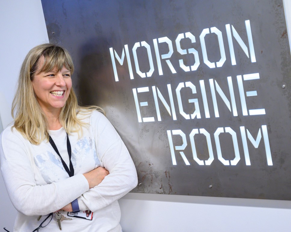 Dr Maria Stukoff against Morson Engine Room signage