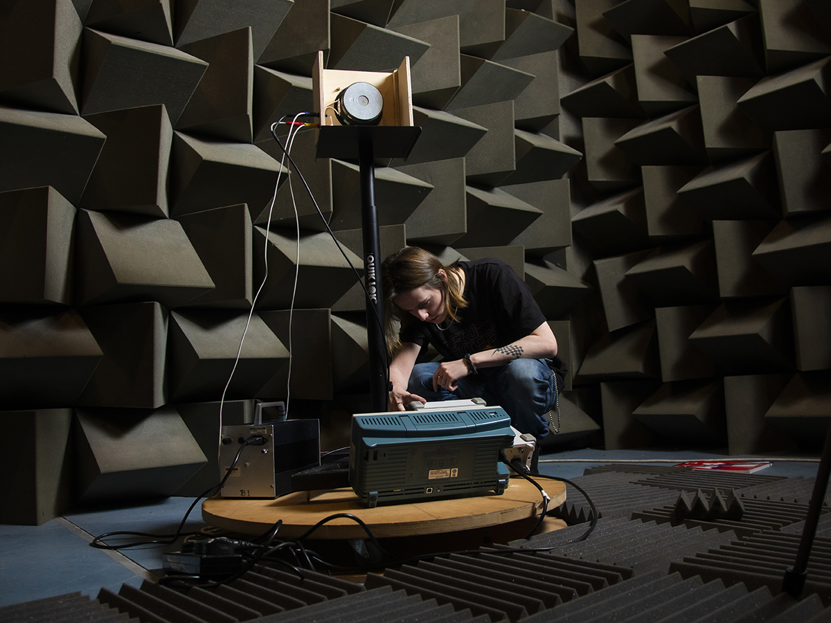 Acoustics student in the anechoic chamber