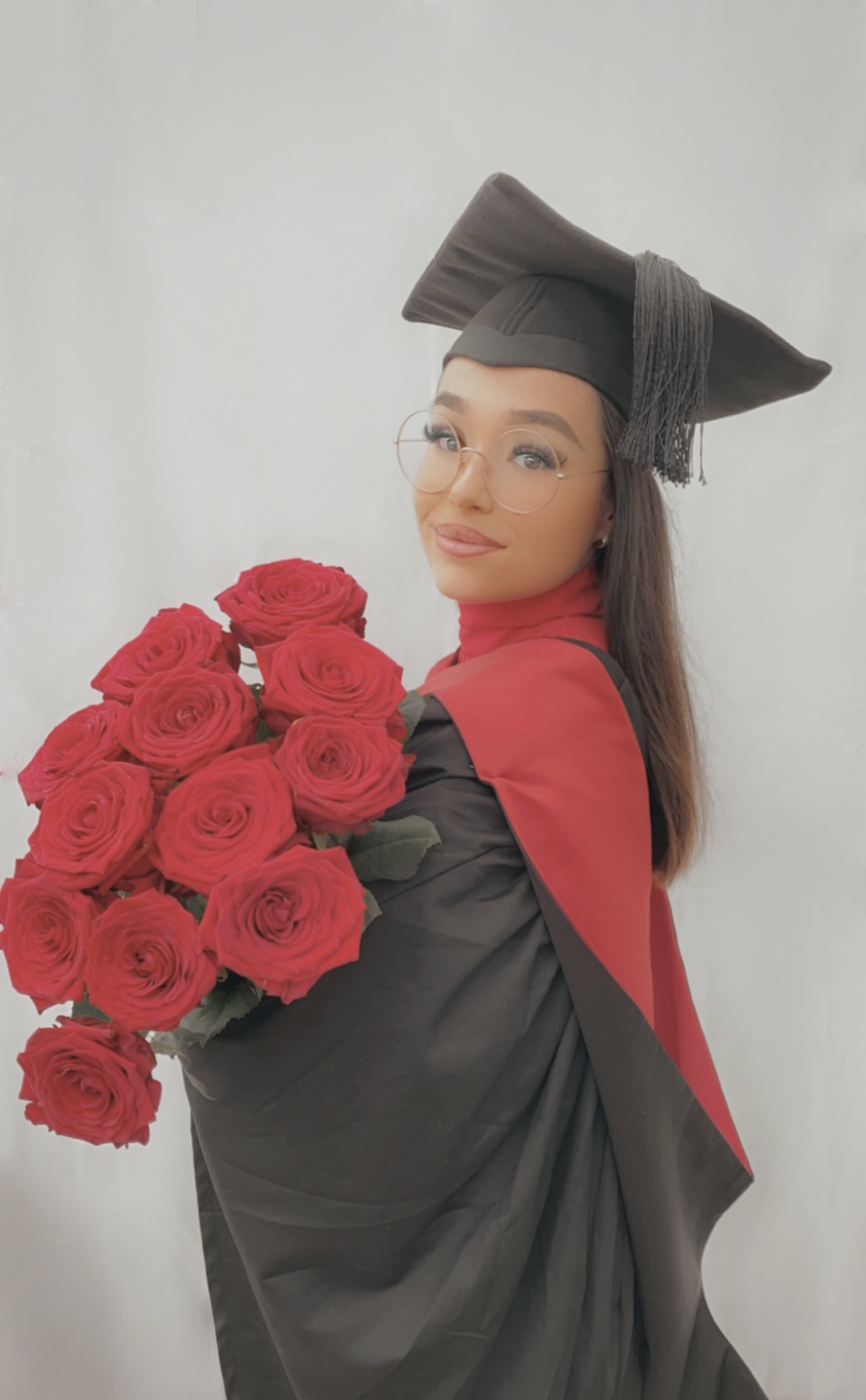 Kennedy Hill graduation photos with red roses