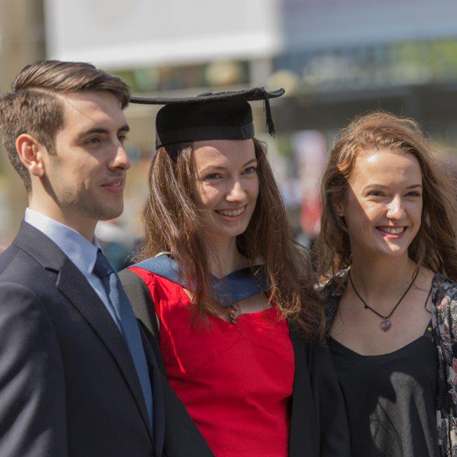 Graduands celebrating with family and friends