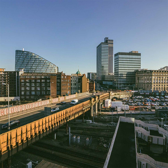 Buildings against Manchester skyline