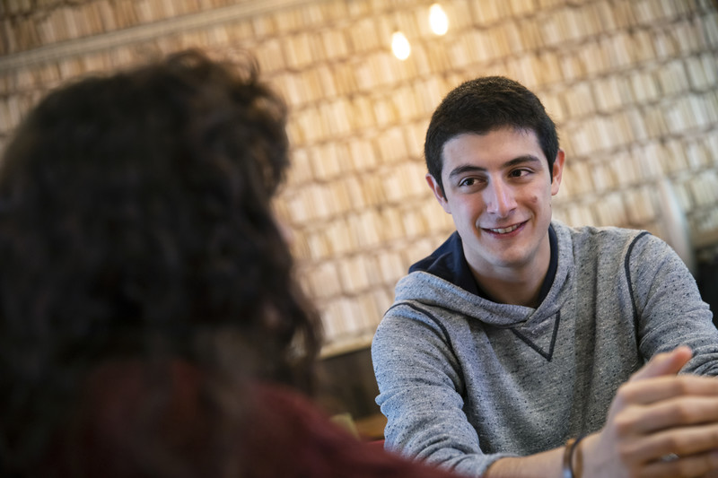 Student having a conversation with an advisor