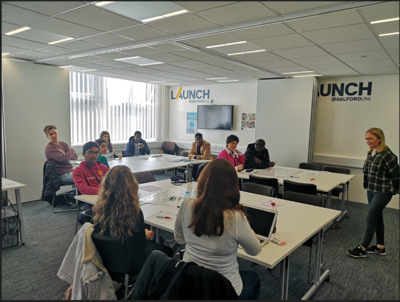 Staff meeting inside a Launch@Salford office, University of Salford