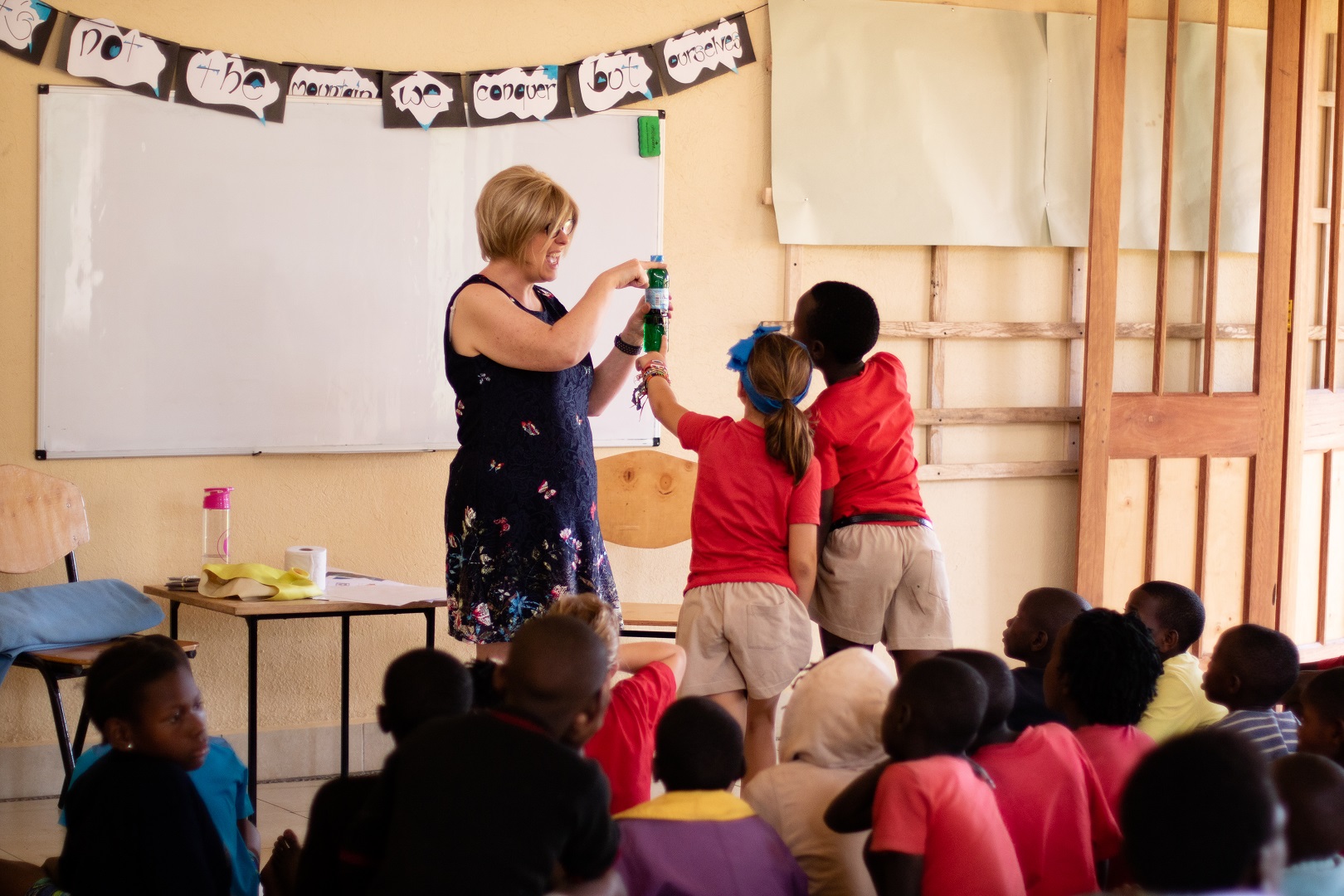 Clare with pupils in Uganda