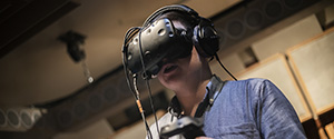 a man wears a VR headset