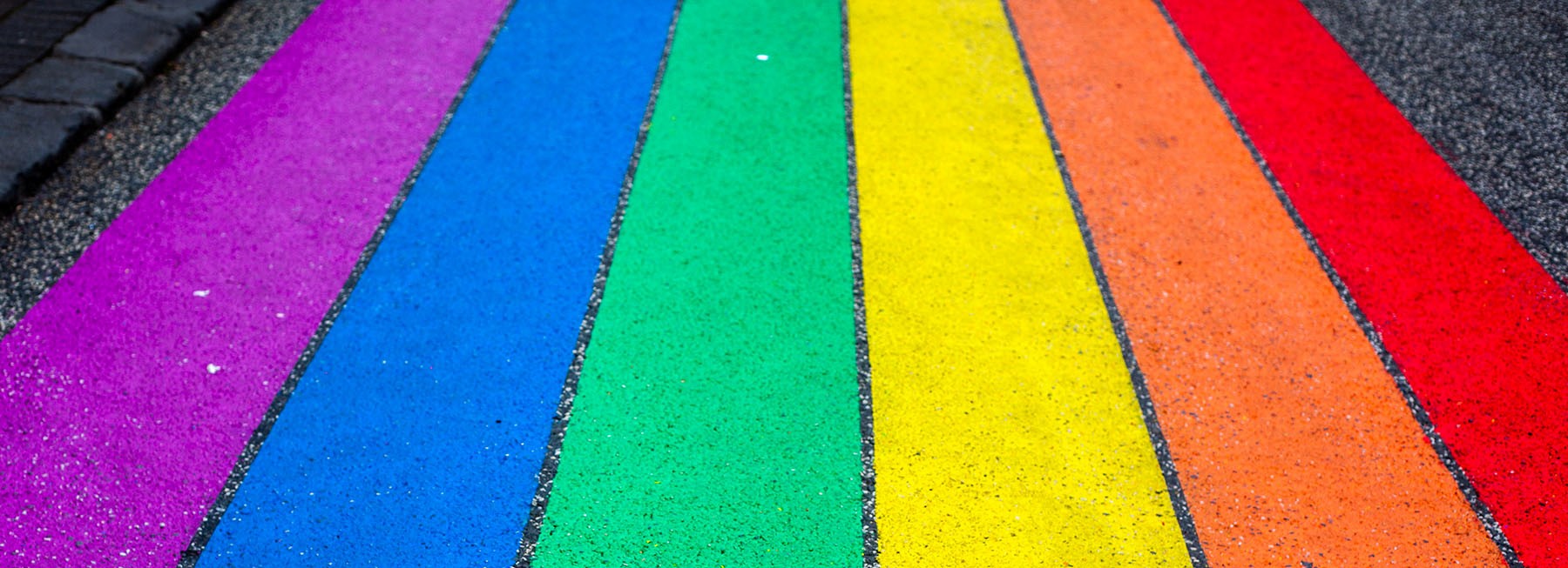 Rainbow colours painted on the road