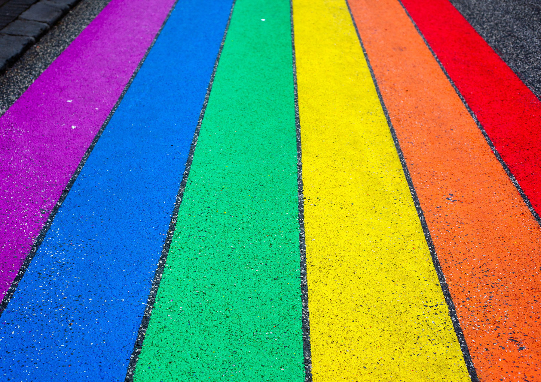 Rainbow stripes painted on the road