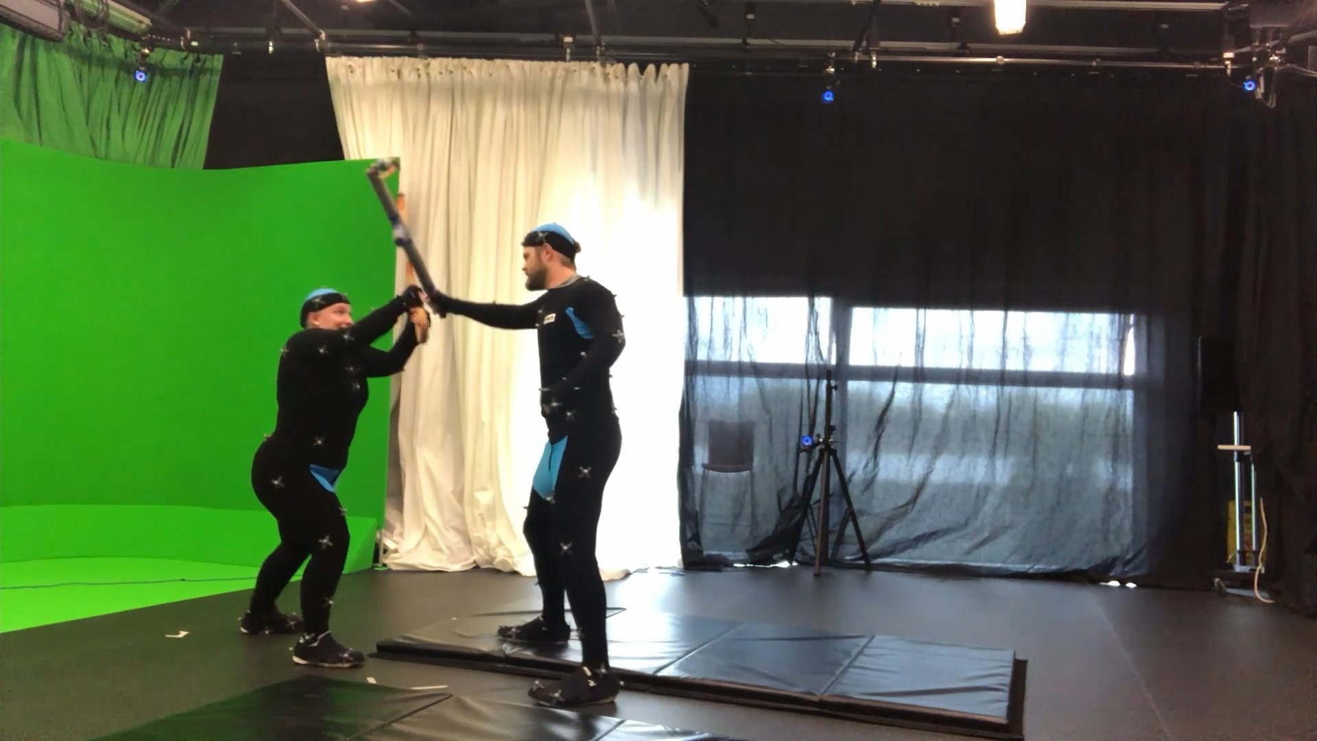 Image shows student Katherine Jarema acting out in the mocap suit for her project