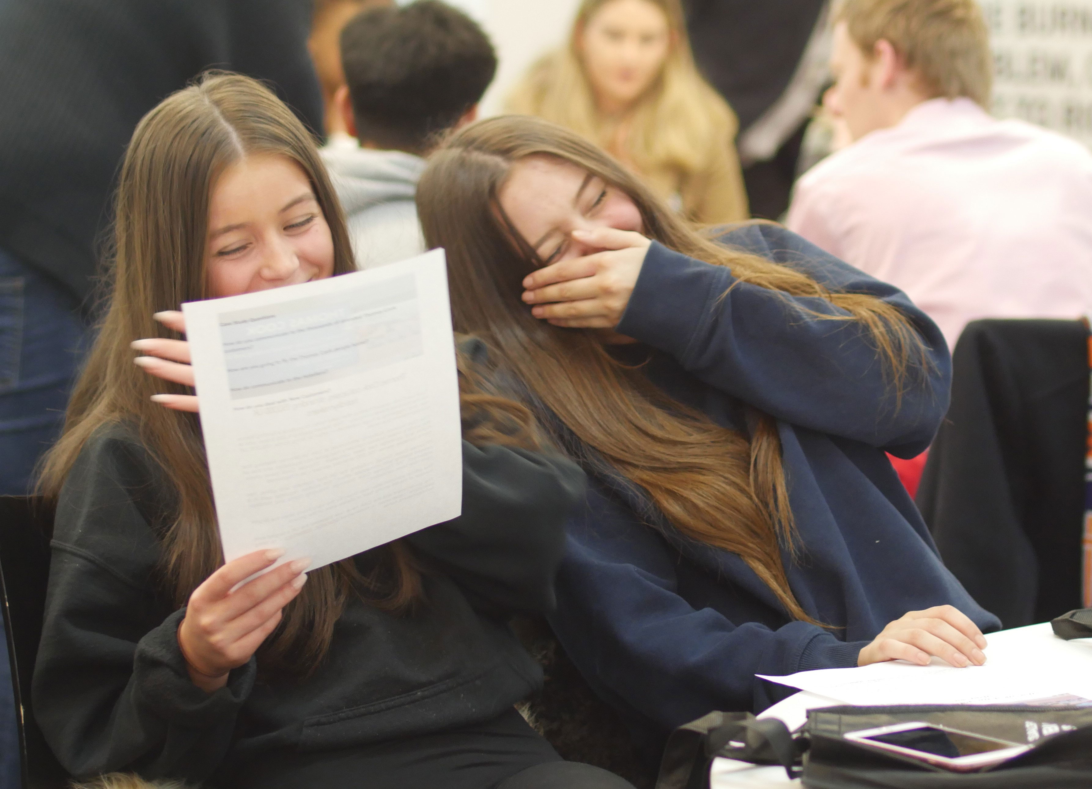 Two Salford Business School applicant visitors laughing