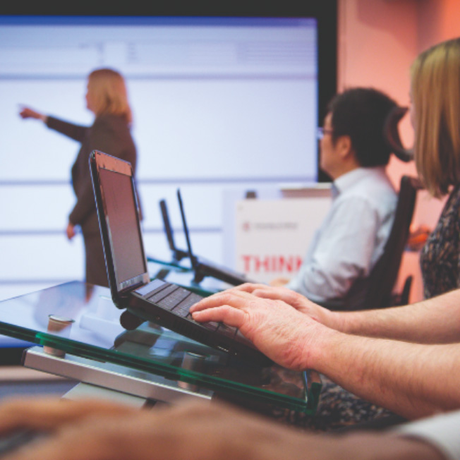 Students using laptops in lecture