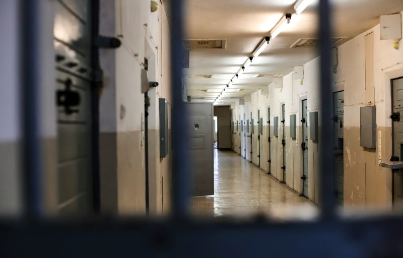 Multiple cell doors in a prison corridor