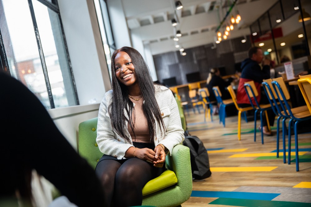 International student chatting in Eat and Drink outlet