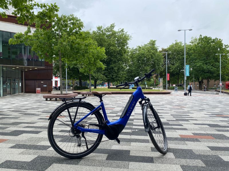 Blue bicycle in Chapman Square, Peel Park Campus