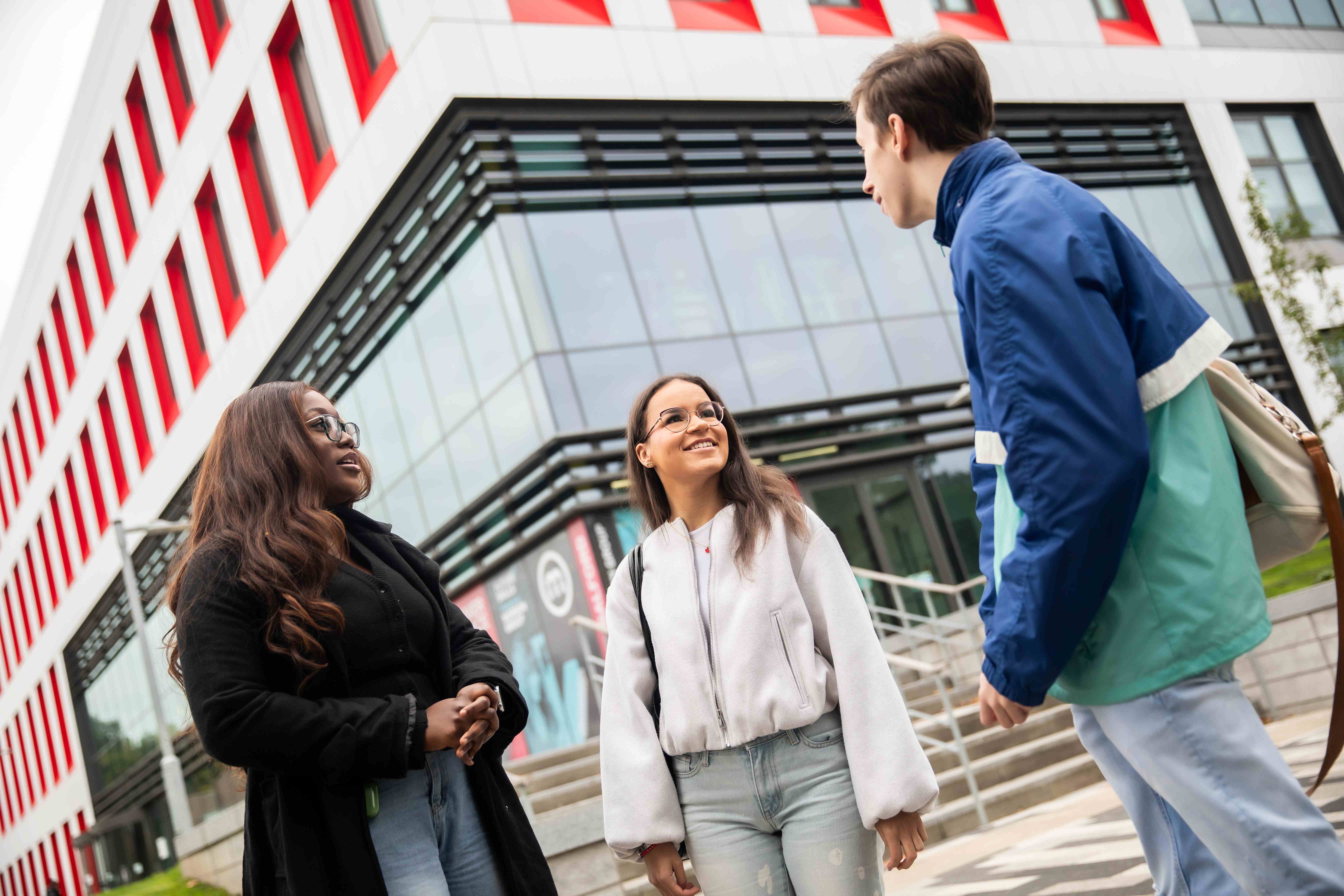 students outside SEE building