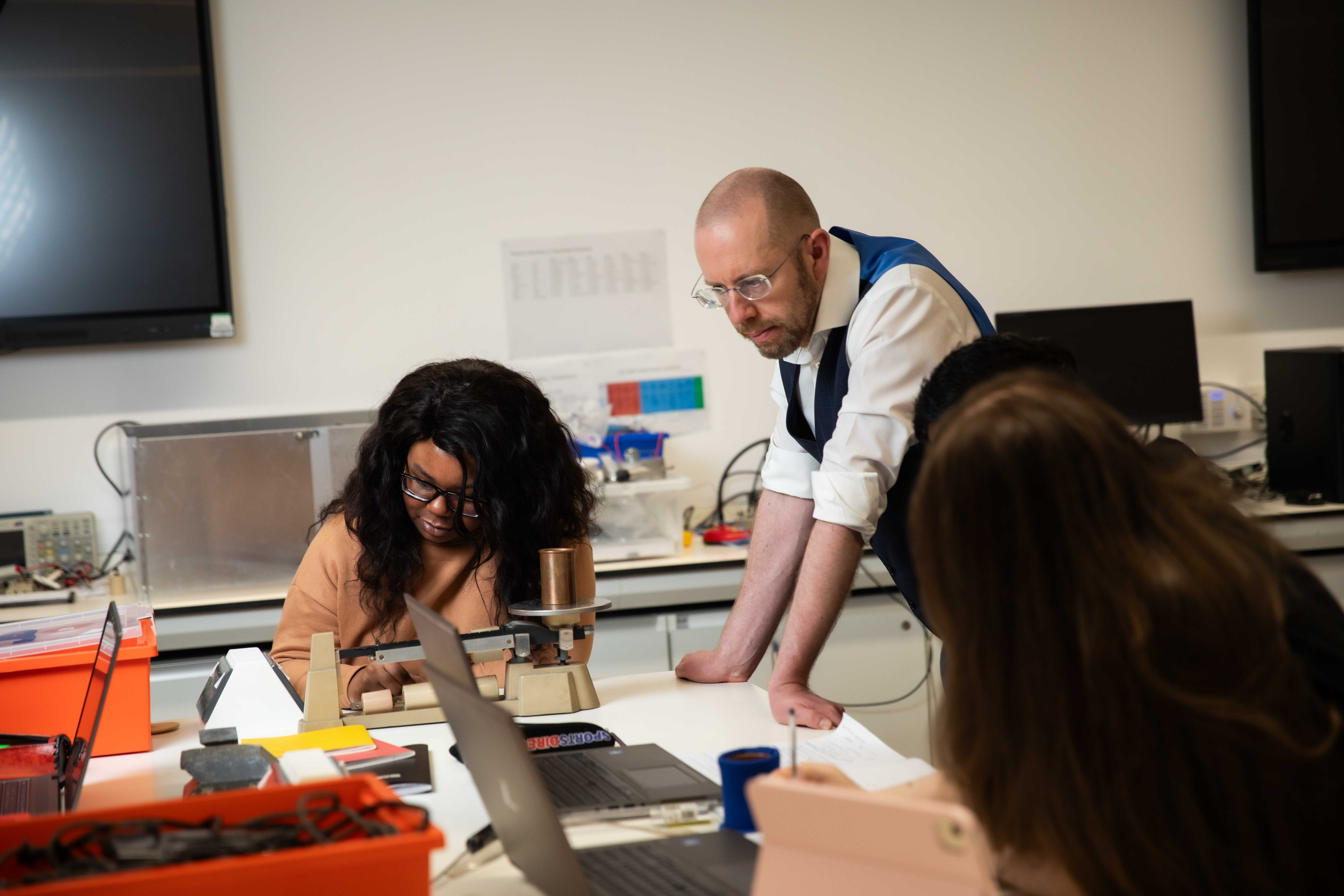 Physics student in the lab