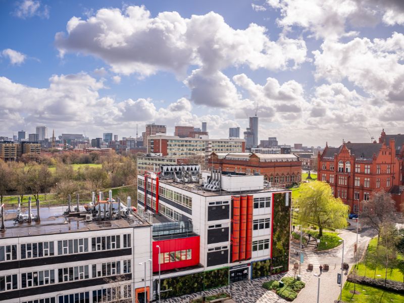 Cockcroft Lab and Peel Building on a sunny day