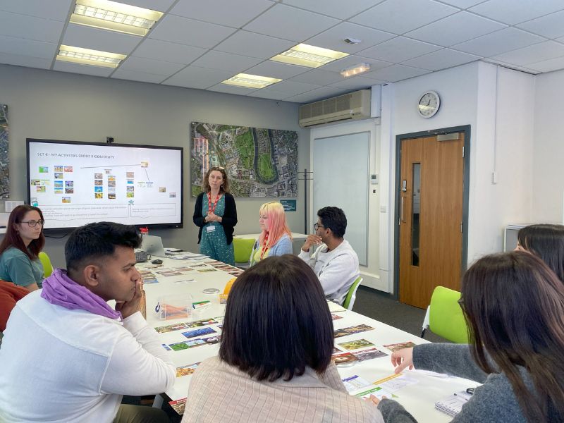 People sat for a presentation on biodiversity