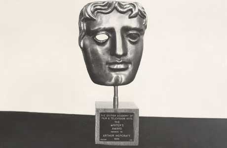 A BAFTA award on a shelf