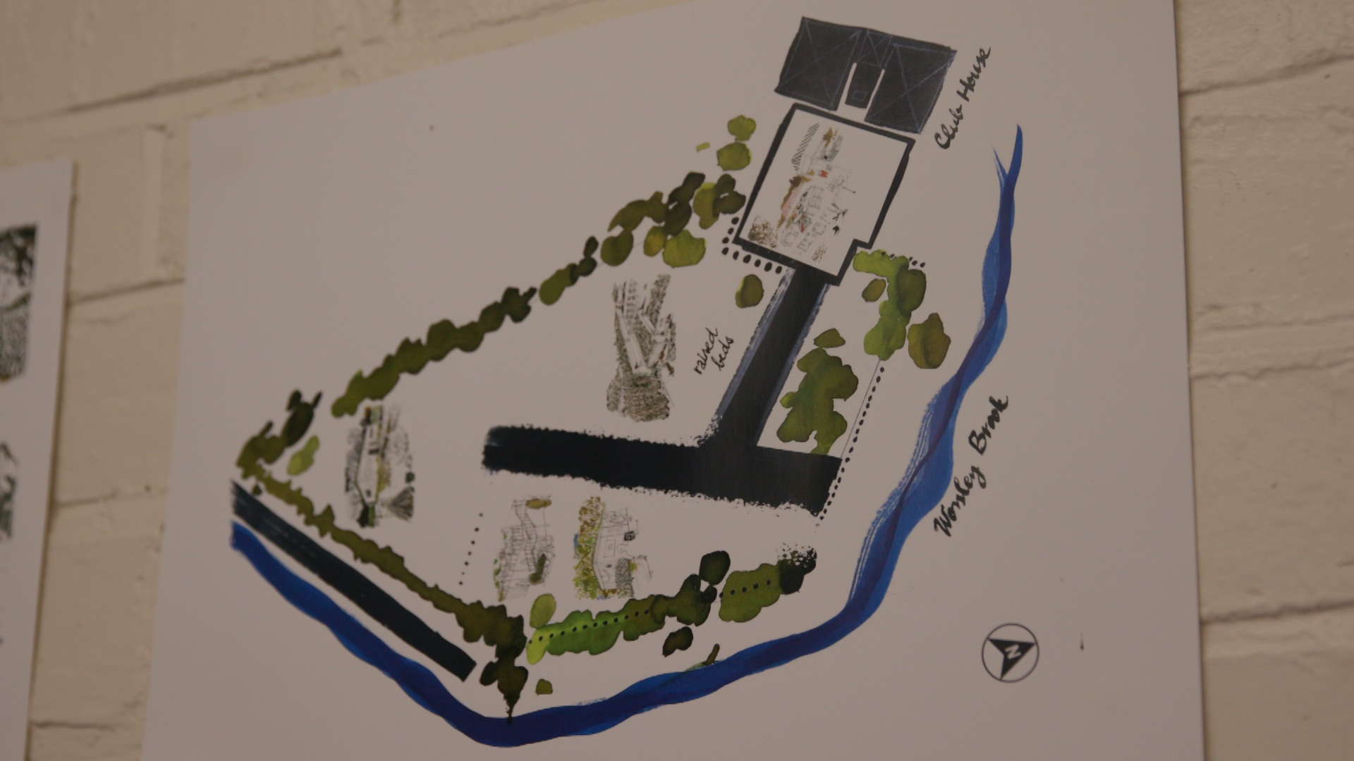 This image shows a draft drawing for land, showing building outlines, green spaces, and boundaries. There is a river that runs around the outside of the greenland and the building.