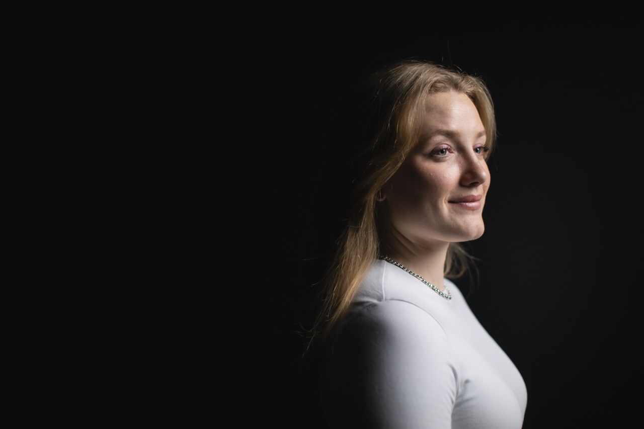 A headshot of a blonde lady