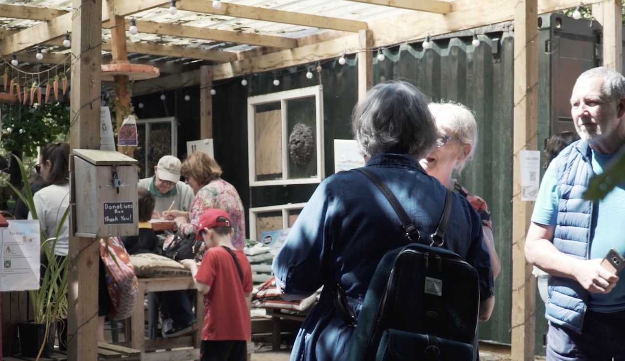 Visitors in the Ivy Den Café at Cleavley Community Forest Garden