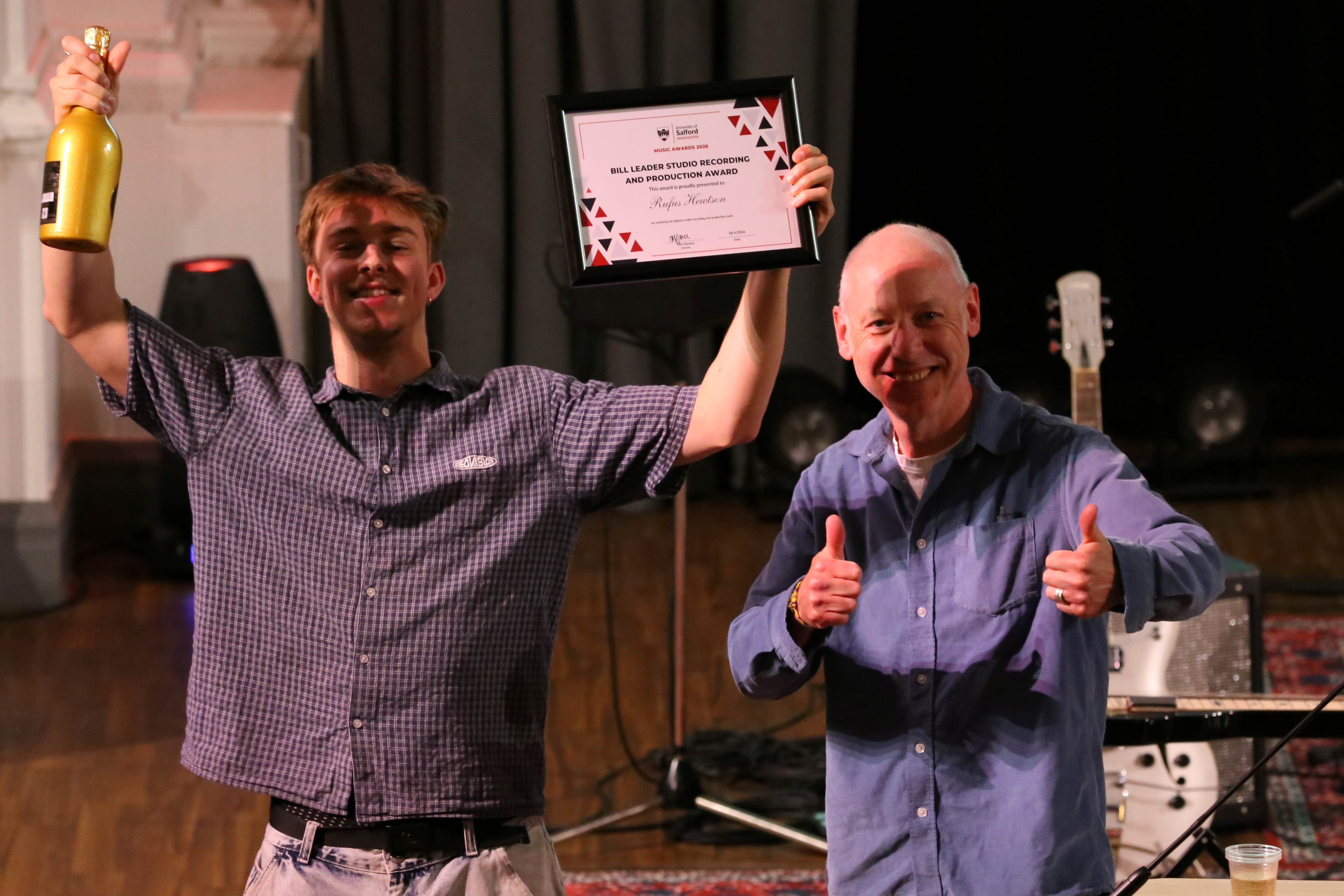 Music student and tutor celebrating their award 
