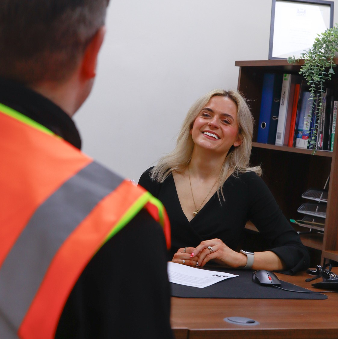 Melissa Strowbridge working at HMG Paints