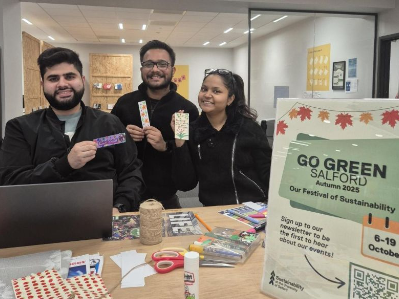 People participating in a crafting workshop or event for the Go Green Salford sustainability festival, University of Salford