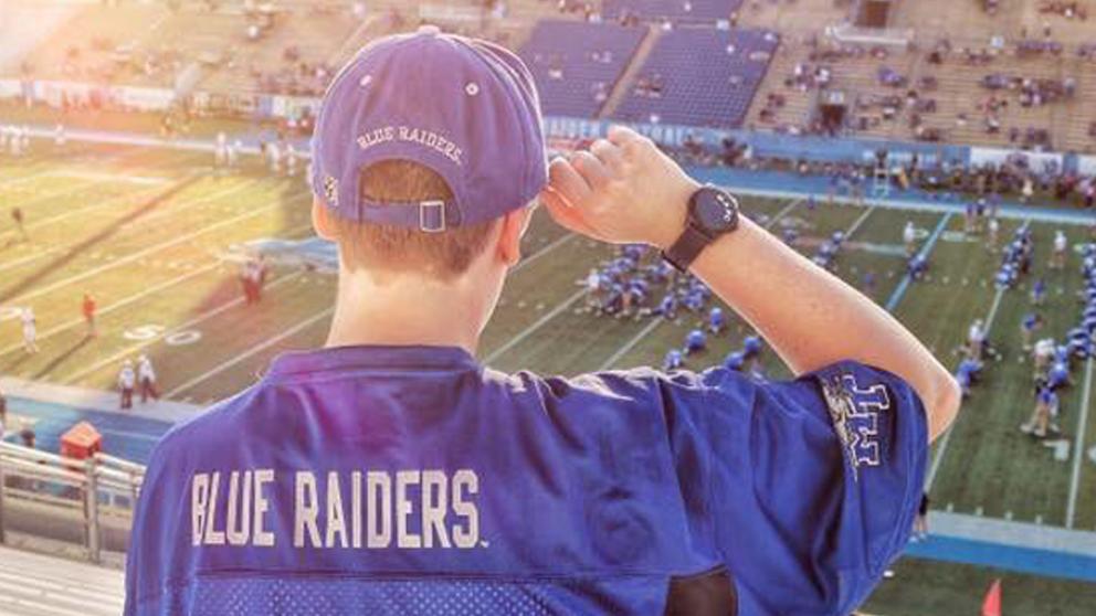 Student at an American football game in the USA