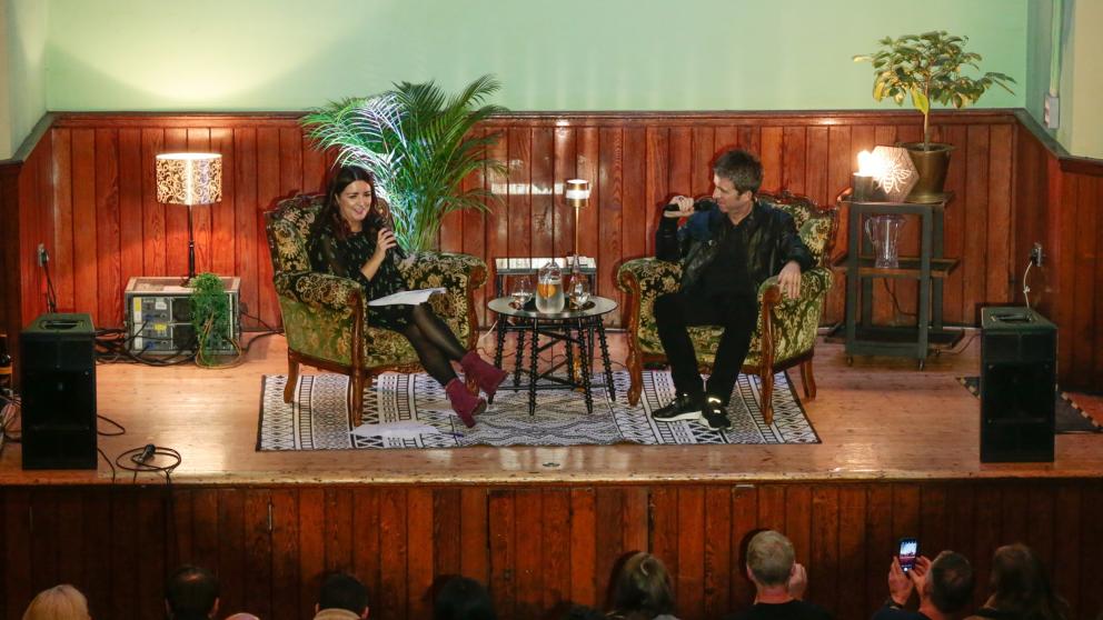 Dr Kirsty Fairclough interviewing Noel Gallagher at the Salford Lads Club