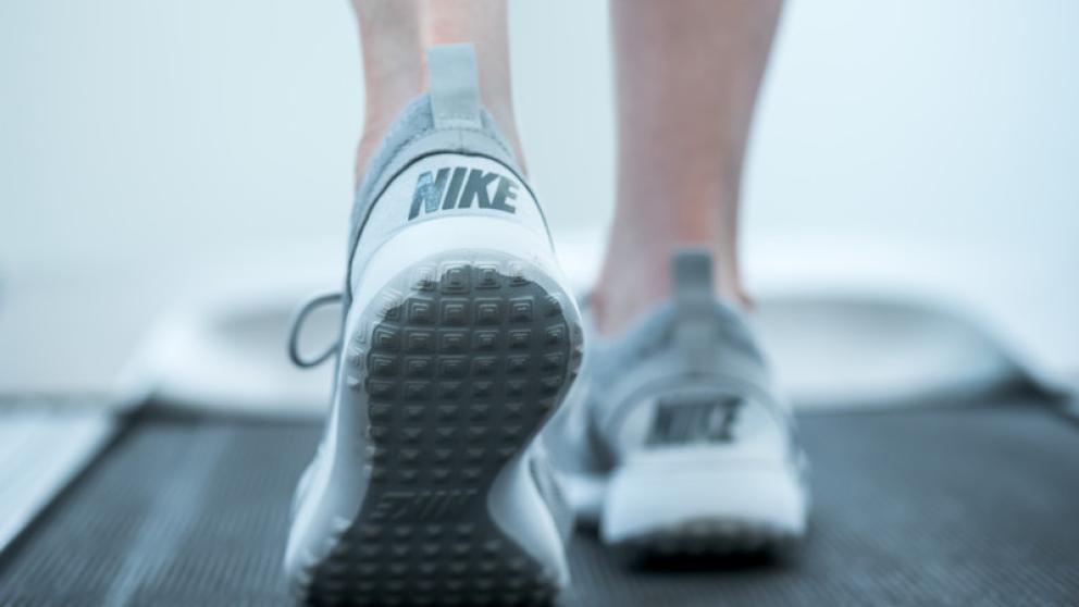 Nike running shoes on a treadmill