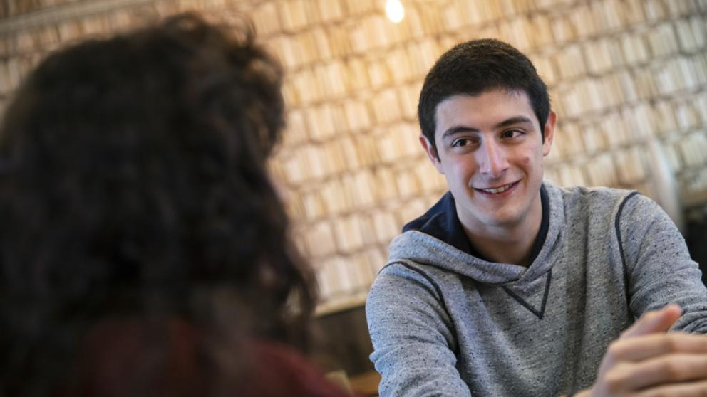 Student having a conversation with an advisor