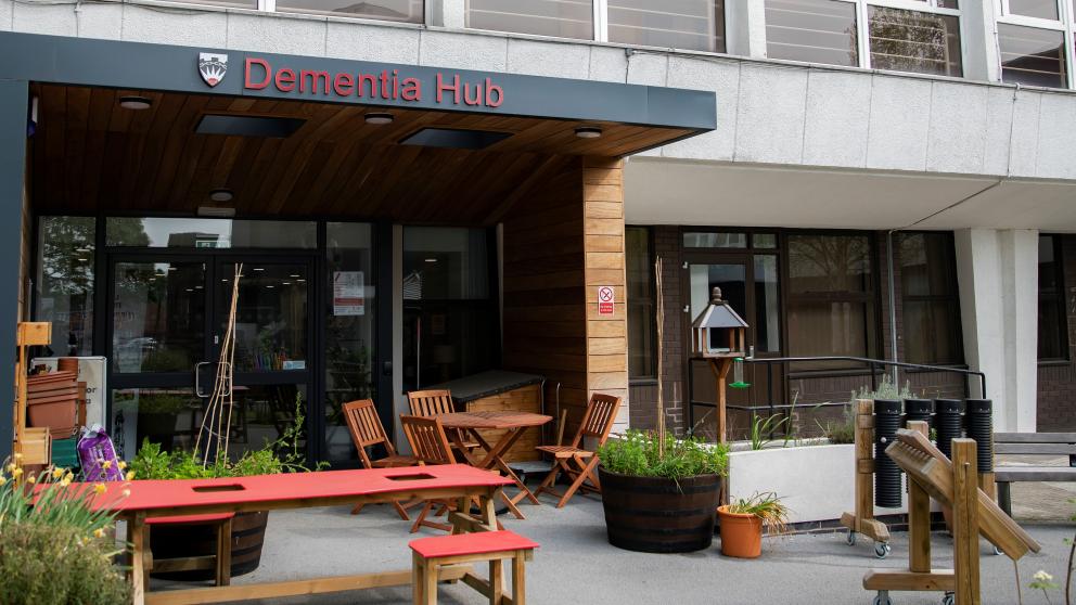 Exterior entrance to the Dementia Hub, with courtyard in the foreground