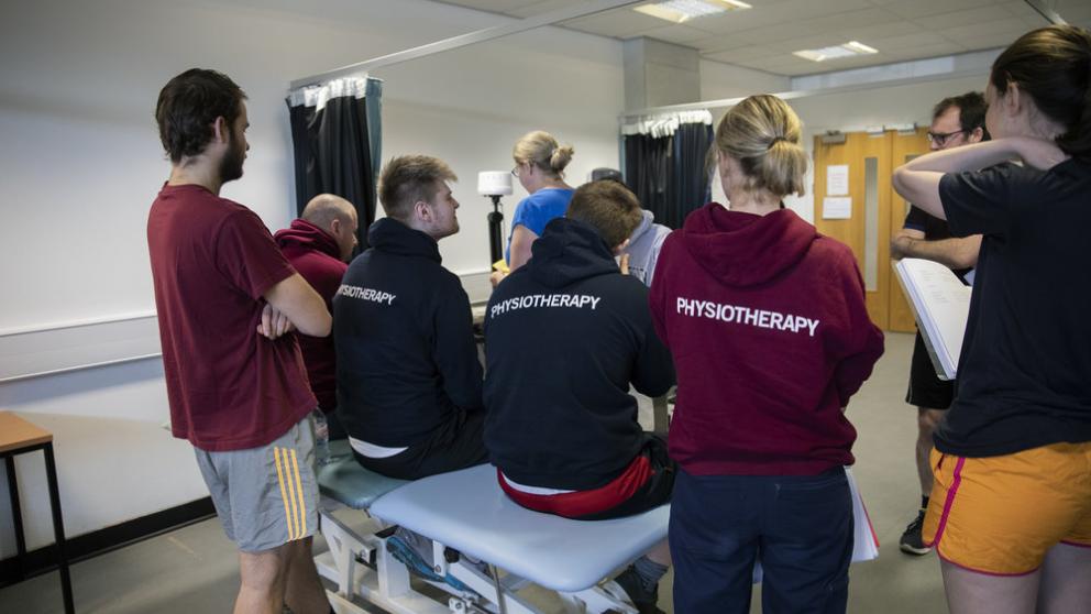 Group of physiotherapy students with supervisor