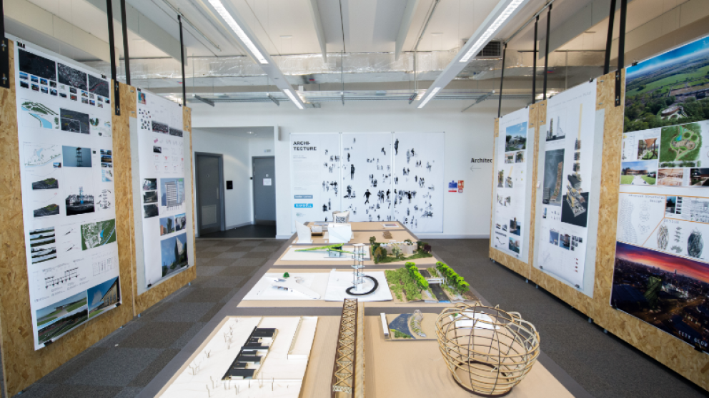 Architectural design and technology studio with designs mounted on the surrounding walls