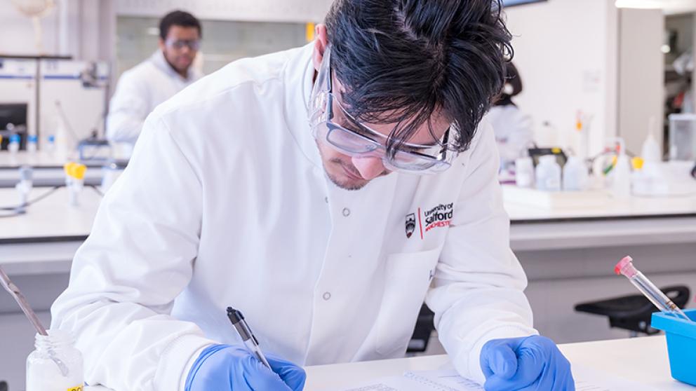 University of Salford Biomedical Science student making notes