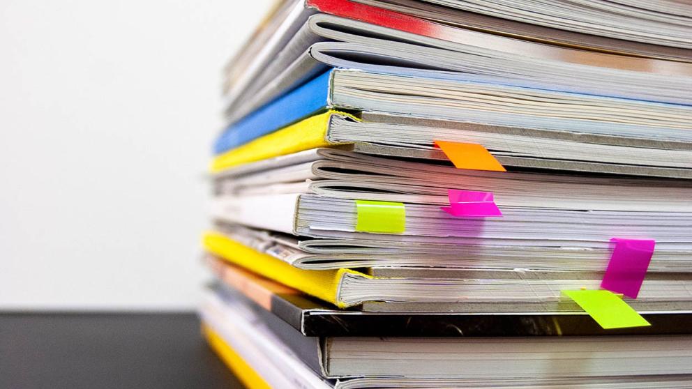 Stack of assorted paper documents