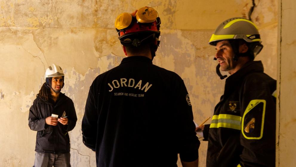 Mujtaba Ghulam onsite with two other search and rescue engineers