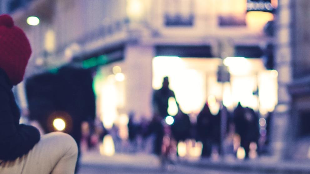 A person sitting on the street