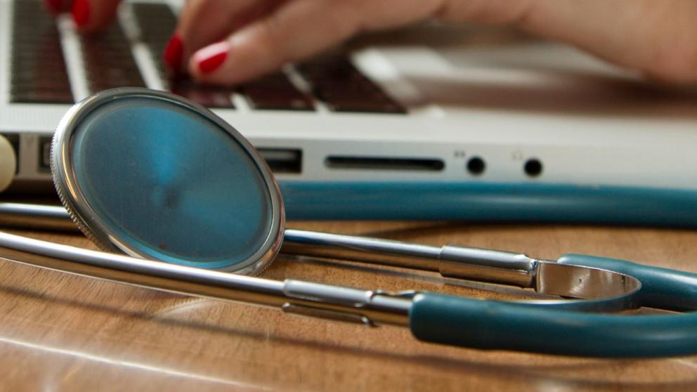 Laptop and stethoscope