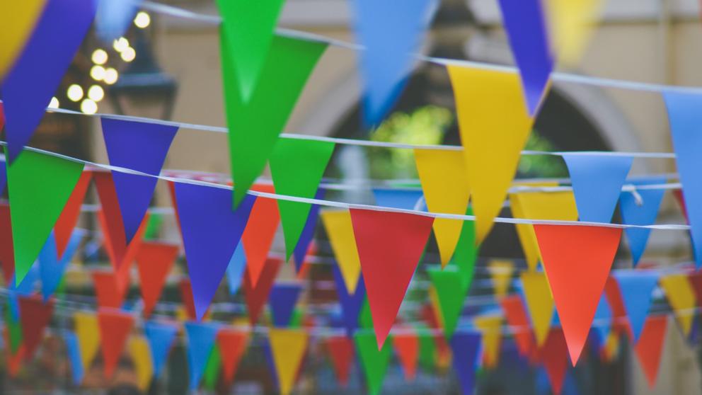 Colorful triangle bunting flags at an outdoor community events