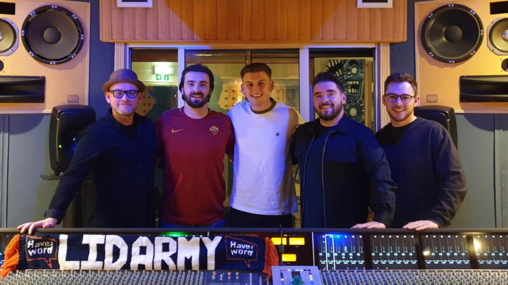 Have A Word podcast and Finn in a group photo.