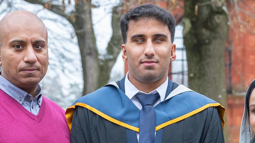 Azeem Amir and his parents at graduation
