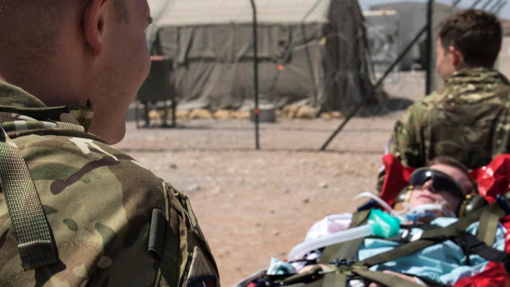 Pictured is a demonstration by an RAF Critical Care Air Support Team, moving a patient.