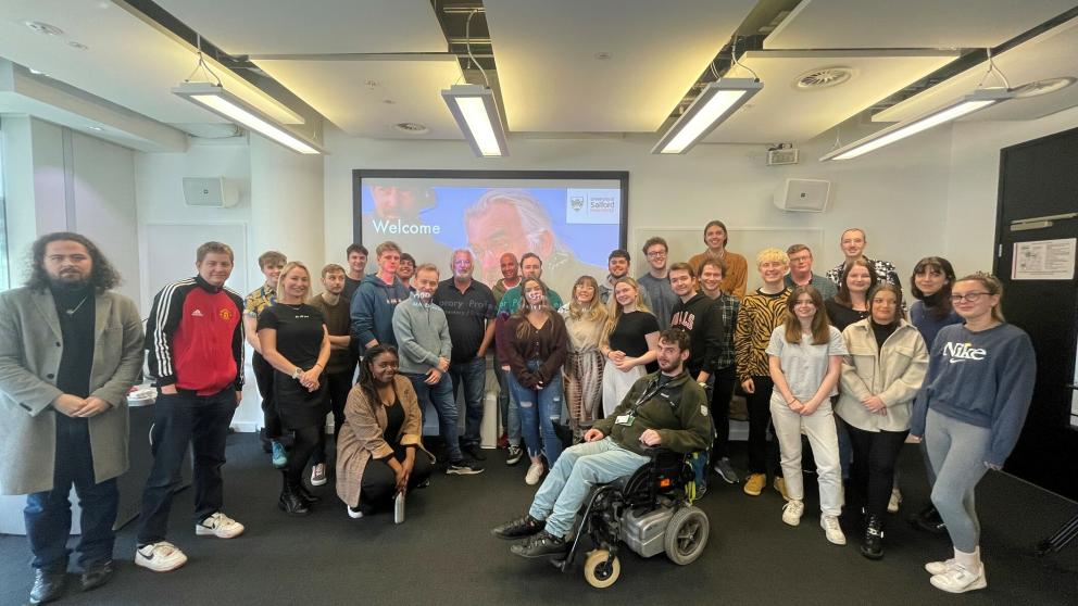 Film director Paul Greengrass with a group of University of Salford students 