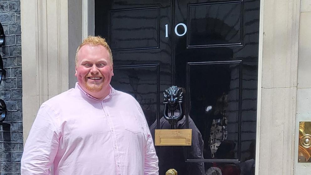Student Jordan Booth standing outside 10 Downing Street