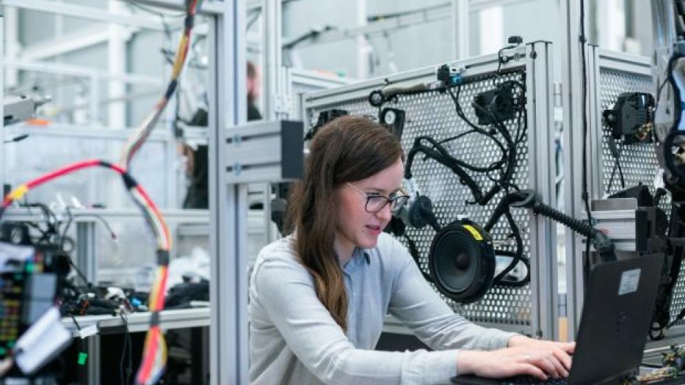 Female engineer running tests