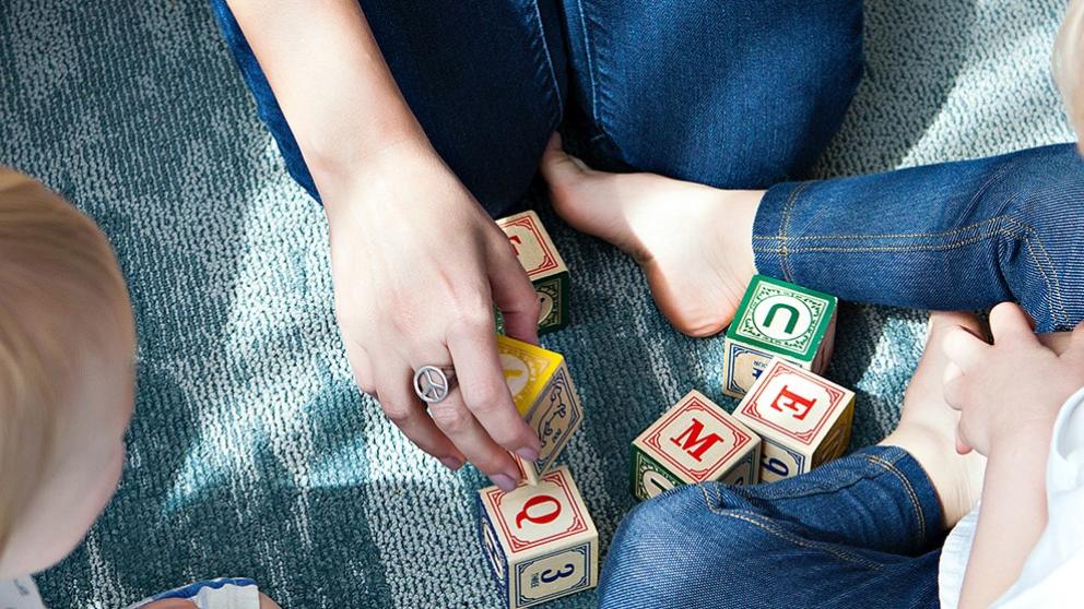 Children playing with wooden blocks