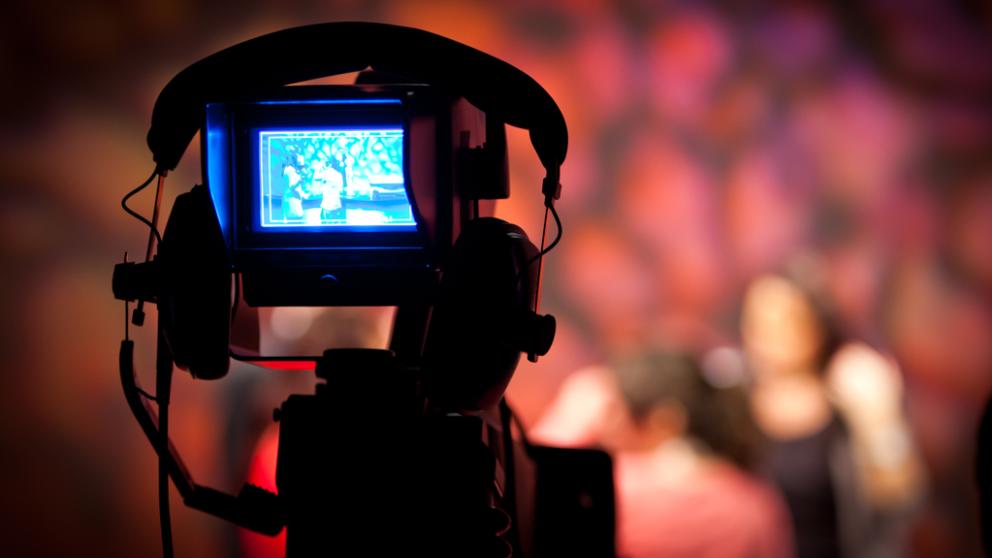 Image shows a camera on a production set 