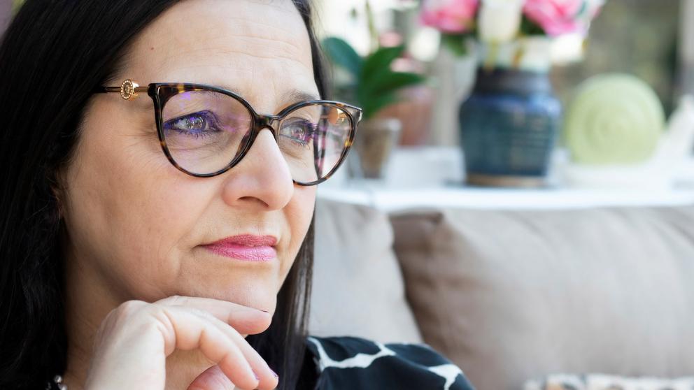 Figen Murray looks to the side in a thoughtful pose